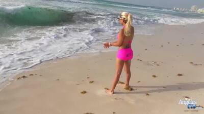 Busty blonde trans in a pink bikini and booty shorts - ashemaletube.com