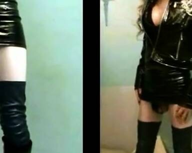 Sissy Sandracduk posing in leather outfit - drtuber.com