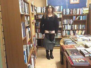 Crossdresser flashing in bookstore - ashemaletube.com